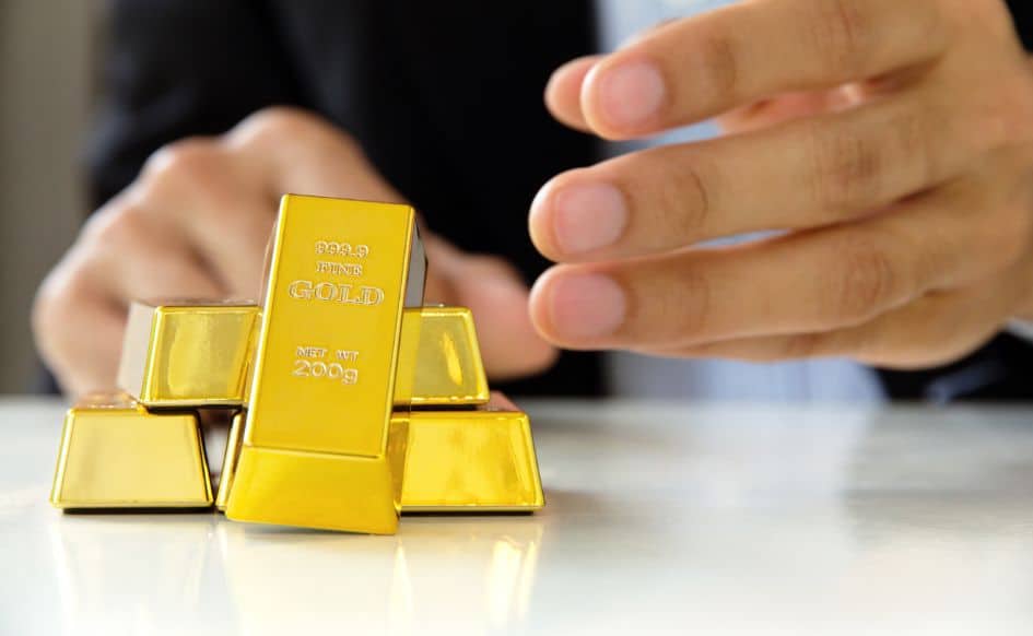 a guy buys gold bars